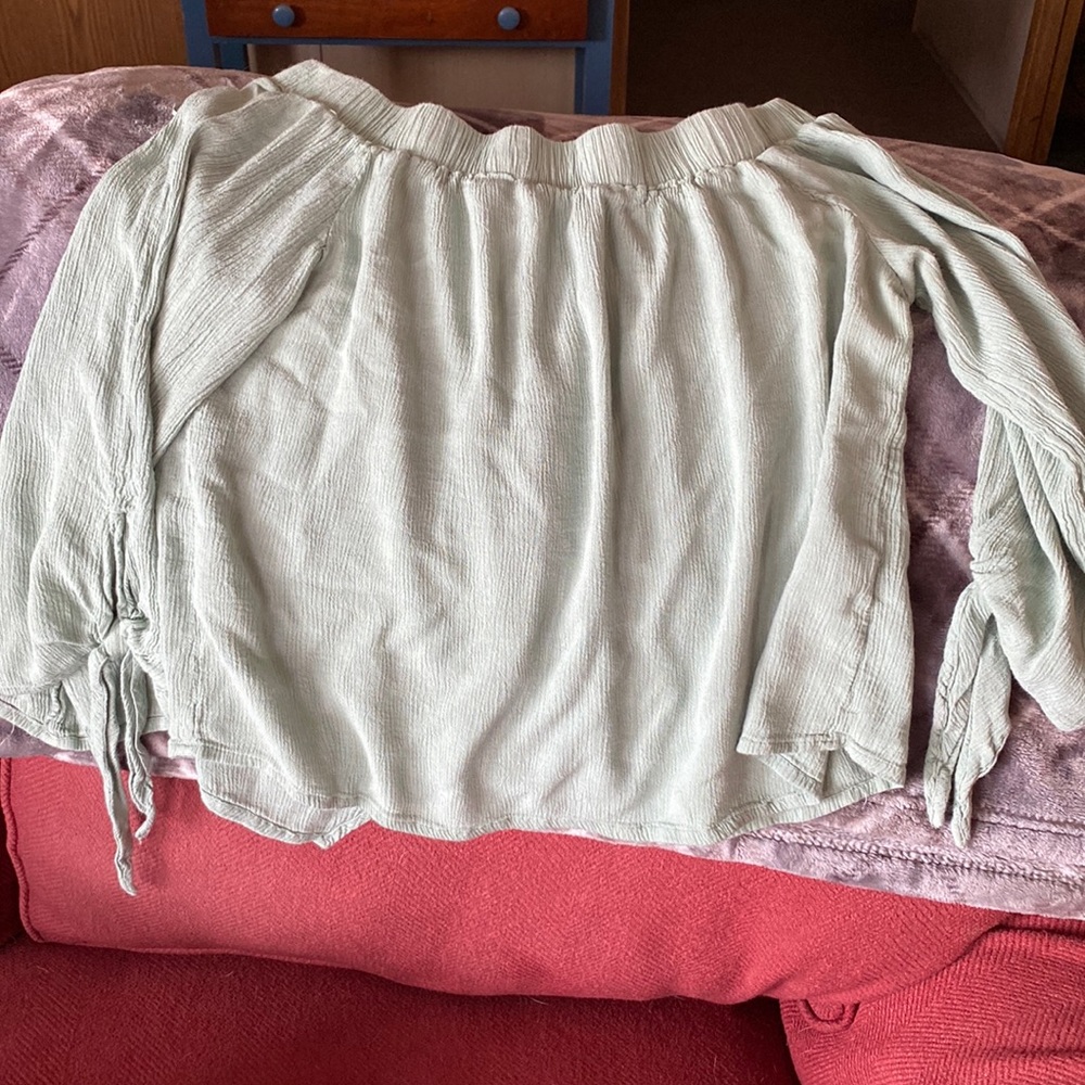Off the shoulder cute shirt.